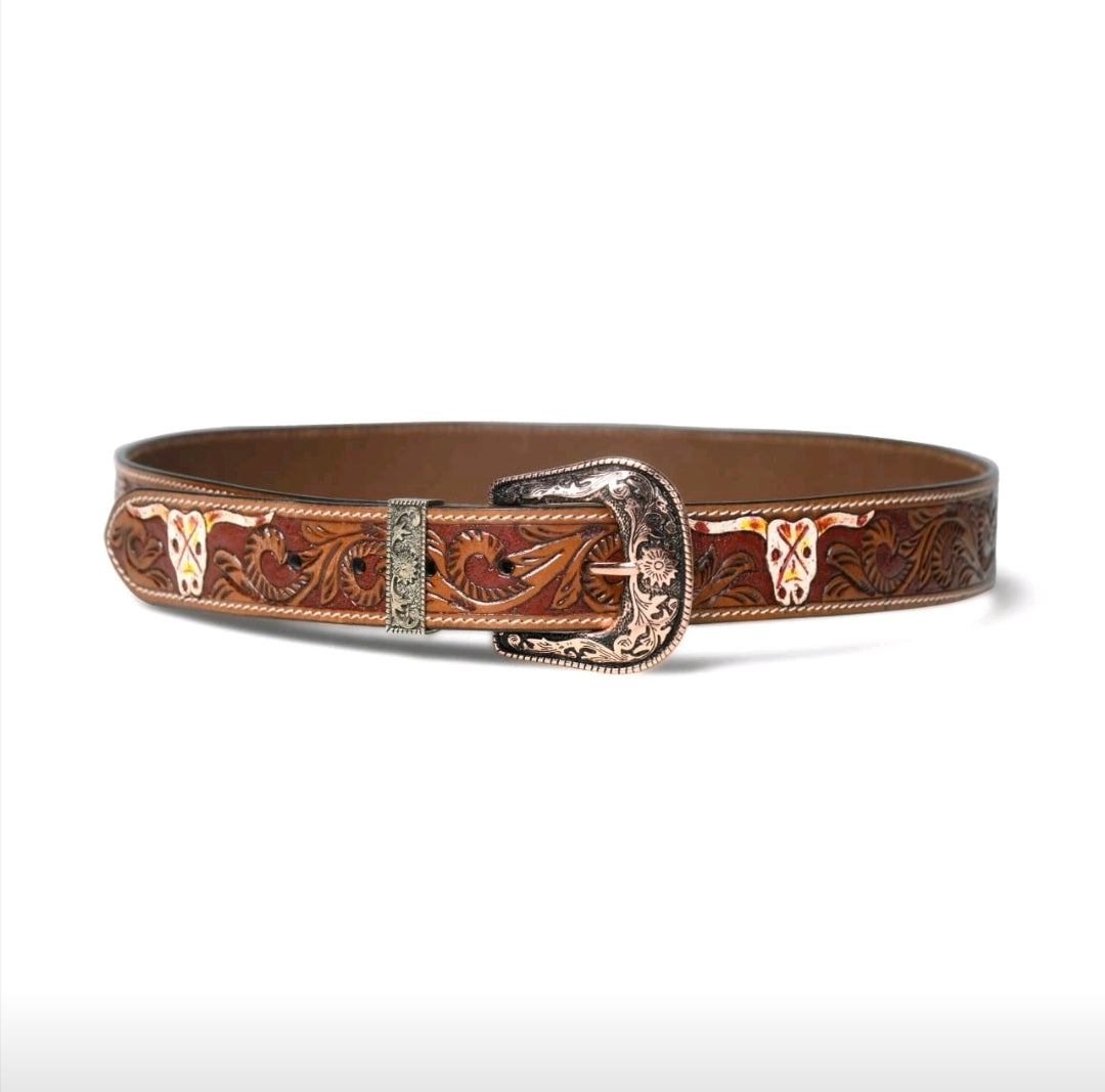 Brown leather belt with intricate designs and a decorative buckle on a white background