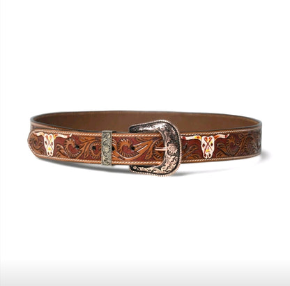 Brown leather belt with intricate designs and a decorative buckle on a white background