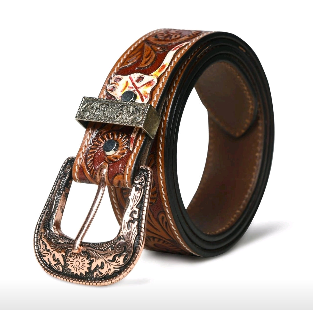 Brown leather belt with intricate embossing and decorative buckle on a white background